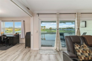 Enjoy peaceful unobstructed views of the lake and golf course on Palm Aire Country Club of Sarasota in Florida - for sale on GolfHomes.com, golf home, golf lot
