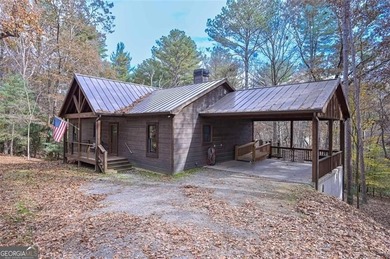 Nestled in the serene beauty of the North Georgia mountains on White Path Golf Club in Georgia - for sale on GolfHomes.com, golf home, golf lot