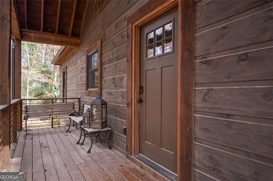 Nestled in the serene beauty of the North Georgia mountains on White Path Golf Club in Georgia - for sale on GolfHomes.com, golf home, golf lot