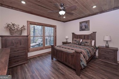 Nestled in the serene beauty of the North Georgia mountains on White Path Golf Club in Georgia - for sale on GolfHomes.com, golf home, golf lot