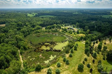 123+ Acres with a Lake, 2 Pole Barns, a Club House & a 2 on Arcadia Hills Golf Course in Michigan - for sale on GolfHomes.com, golf home, golf lot