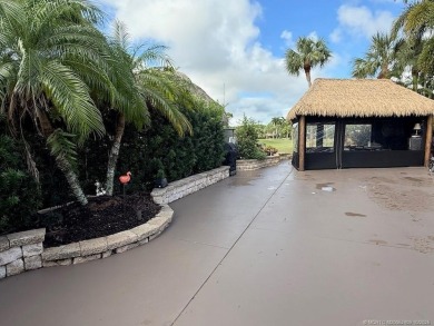 This beautifully landscaped tiki lot offers breathtaking sunset on Motorcoach Resort Golf Course in Florida - for sale on GolfHomes.com, golf home, golf lot