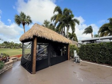 This beautifully landscaped tiki lot offers breathtaking sunset on Motorcoach Resort Golf Course in Florida - for sale on GolfHomes.com, golf home, golf lot