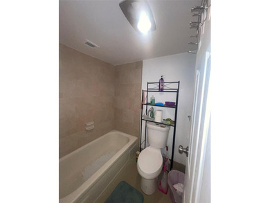 Spacious and well-maintained 2-bedroom, 2-bath condo located in on Inverrary Country Club in Florida - for sale on GolfHomes.com, golf home, golf lot