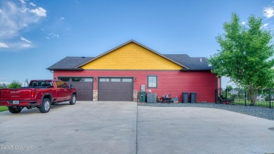 Welcome to this charming custom home on 1.11 acres with on Bell Nob Golf Course in Wyoming - for sale on GolfHomes.com, golf home, golf lot