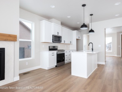 Ask about current builder incentives! This new construction home on Teton Reserve in Idaho - for sale on GolfHomes.com, golf home, golf lot