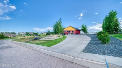 Welcome to this charming custom home on 1.11 acres with on Bell Nob Golf Course in Wyoming - for sale on GolfHomes.com, golf home, golf lot