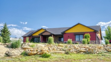 Welcome to this charming custom home on 1.11 acres with on Bell Nob Golf Course in Wyoming - for sale on GolfHomes.com, golf home, golf lot