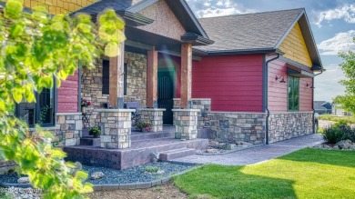 Welcome to this charming custom home on 1.11 acres with on Bell Nob Golf Course in Wyoming - for sale on GolfHomes.com, golf home, golf lot
