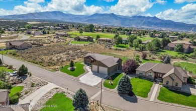 Are you looking for a like new custom home without the hassle of on Battlement Mesa Golf Course in Colorado - for sale on GolfHomes.com, golf home, golf lot