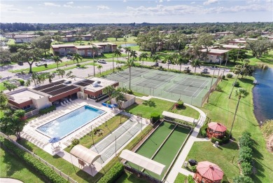 Ultra clean, nicely furnished 2BR/2BA condo tucked into the NW on The American Golf Club in Florida - for sale on GolfHomes.com, golf home, golf lot