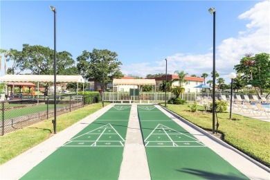 Ultra clean, nicely furnished 2BR/2BA condo tucked into the NW on The American Golf Club in Florida - for sale on GolfHomes.com, golf home, golf lot