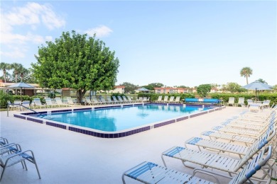 Ultra clean, nicely furnished 2BR/2BA condo tucked into the NW on The American Golf Club in Florida - for sale on GolfHomes.com, golf home, golf lot