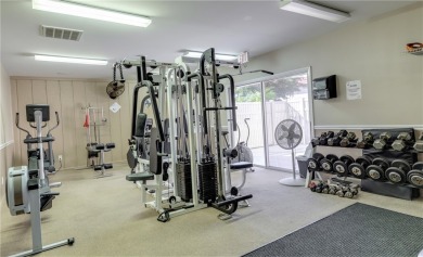 Ultra clean, nicely furnished 2BR/2BA condo tucked into the NW on The American Golf Club in Florida - for sale on GolfHomes.com, golf home, golf lot