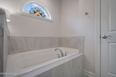 Discover resort-style living in this beautiful updated 3 bedroom on Porters Neck Country Club in North Carolina - for sale on GolfHomes.com, golf home, golf lot