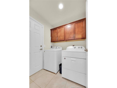 Charming 2BR/2BA CBS home in Spanish Lakes County Club Village! on Spanish Lakes Country Club in Florida - for sale on GolfHomes.com, golf home, golf lot