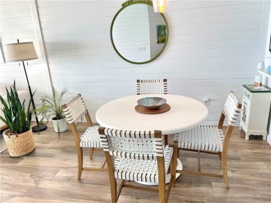 Welcome to your coastal retreat! This beautifully furnished on Island Dunes Country Club in Florida - for sale on GolfHomes.com, golf home, golf lot