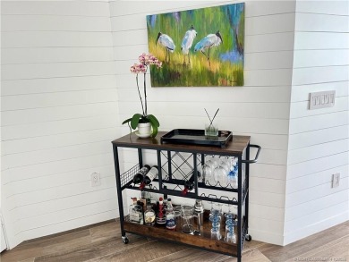 Welcome to your coastal retreat! This beautifully furnished on Island Dunes Country Club in Florida - for sale on GolfHomes.com, golf home, golf lot