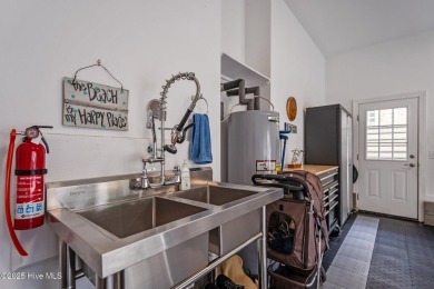 Discover resort-style living in this beautiful updated 3 bedroom on Porters Neck Country Club in North Carolina - for sale on GolfHomes.com, golf home, golf lot