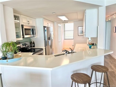 Welcome to your coastal retreat! This beautifully furnished on Island Dunes Country Club in Florida - for sale on GolfHomes.com, golf home, golf lot