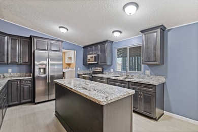 Welcome to this beautifully remodeled, fully furnished 3-bedroom on Painted Mountain Golf Club in Arizona - for sale on GolfHomes.com, golf home, golf lot