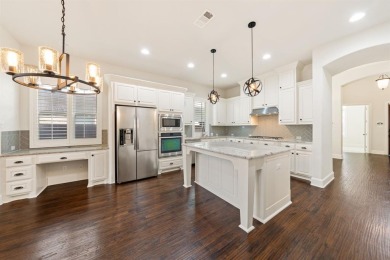 Welcome to resort-style living in The Tribute, a premier on The Tribute At the Colony in Texas - for sale on GolfHomes.com, golf home, golf lot