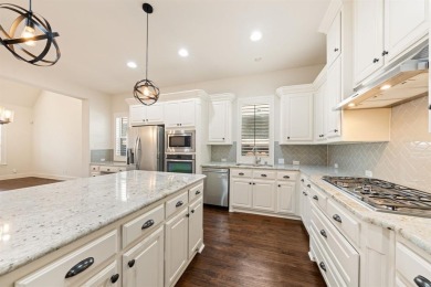 Welcome to resort-style living in The Tribute, a premier on The Tribute At the Colony in Texas - for sale on GolfHomes.com, golf home, golf lot