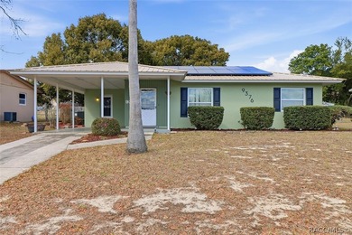 Updates Galore!!! 2 Bedroom, 2 bath with attached carport, METAL on Citrus Springs Country Club in Florida - for sale on GolfHomes.com, golf home, golf lot