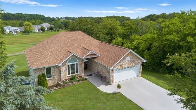Welcome to 407 Kahite Trail, a stunning golf-front home, located on Tellico Village -The Links At Kahite Golf Course in Tennessee - for sale on GolfHomes.com, golf home, golf lot