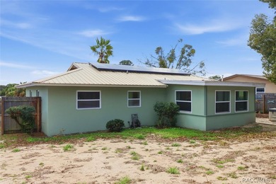 Updates Galore!!! 2 Bedroom, 2 bath with attached carport, METAL on Citrus Springs Country Club in Florida - for sale on GolfHomes.com, golf home, golf lot