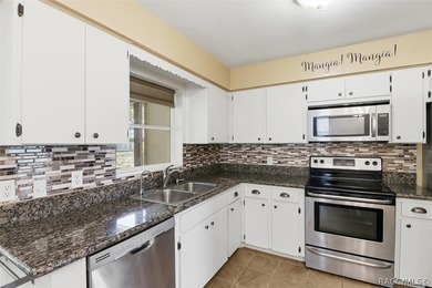 Updates Galore!!! 2 Bedroom, 2 bath with attached carport, METAL on Citrus Springs Country Club in Florida - for sale on GolfHomes.com, golf home, golf lot