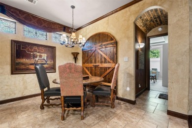 Located in one of Trophy Club's most desirable gated communities on Trophy Club of Dallas in Texas - for sale on GolfHomes.com, golf home, golf lot