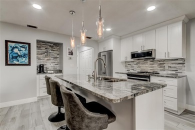 WELCOME HOME to this beautifully updated Open and Spacious villa on Seminole Lake Country Club in Florida - for sale on GolfHomes.com, golf home, golf lot