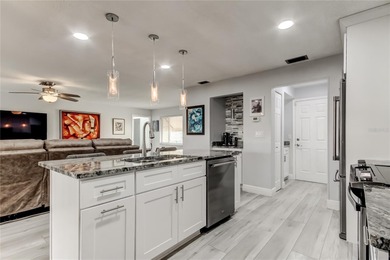 WELCOME HOME to this beautifully updated Open and Spacious villa on Seminole Lake Country Club in Florida - for sale on GolfHomes.com, golf home, golf lot