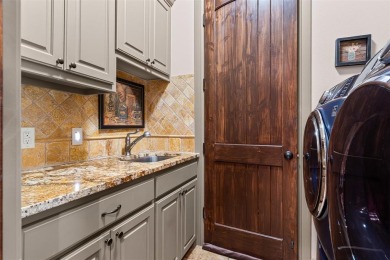 Located in one of Trophy Club's most desirable gated communities on Trophy Club of Dallas in Texas - for sale on GolfHomes.com, golf home, golf lot