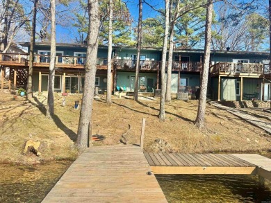 Steps to Lake off back porch with your own private boat dock! on DeSoto Golf Course in Arkansas - for sale on GolfHomes.com, golf home, golf lot