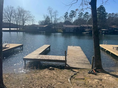 Steps to Lake off back porch with your own private boat dock! on DeSoto Golf Course in Arkansas - for sale on GolfHomes.com, golf home, golf lot