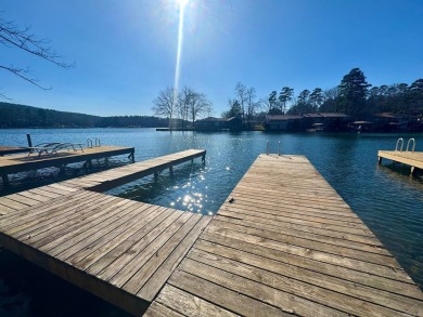 Steps to Lake off back porch with your own private boat dock! on DeSoto Golf Course in Arkansas - for sale on GolfHomes.com, golf home, golf lot
