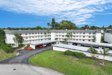 Enjoy tranquil golf course views and contemporary coastal style on Royal Palm Golf Club in Florida - for sale on GolfHomes.com, golf home, golf lot