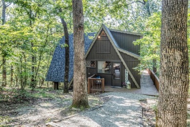 Beautiful chalet surrounded by a gorgeous wooded lot for amazing on Innsbrook Resort Golf Course in Missouri - for sale on GolfHomes.com, golf home, golf lot