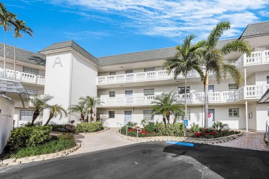 Enjoy tranquil golf course views and contemporary coastal style on Royal Palm Golf Club in Florida - for sale on GolfHomes.com, golf home, golf lot