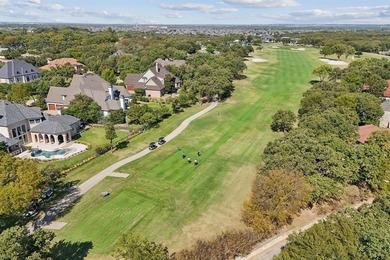 Located in Trophy Club's most desirable guarded gated community on Trophy Club of Dallas in Texas - for sale on GolfHomes.com, golf home, golf lot