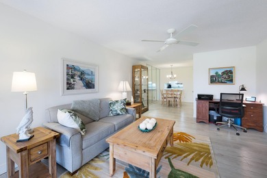 Enjoy tranquil golf course views and contemporary coastal style on Royal Palm Golf Club in Florida - for sale on GolfHomes.com, golf home, golf lot