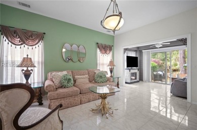 Light-Filled One-Level End Unit in Sun City! Nestled in a on Okatie Creek Golf Club in South Carolina - for sale on GolfHomes.com, golf home, golf lot