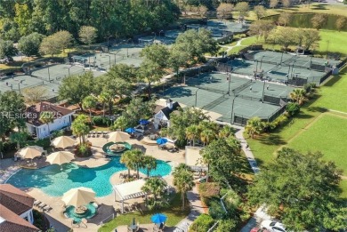 Light-Filled One-Level End Unit in Sun City! Nestled in a on Okatie Creek Golf Club in South Carolina - for sale on GolfHomes.com, golf home, golf lot