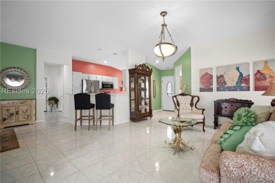 Light-Filled One-Level End Unit in Sun City! Nestled in a on Okatie Creek Golf Club in South Carolina - for sale on GolfHomes.com, golf home, golf lot