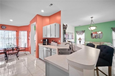 Light-Filled One-Level End Unit in Sun City! Nestled in a on Okatie Creek Golf Club in South Carolina - for sale on GolfHomes.com, golf home, golf lot