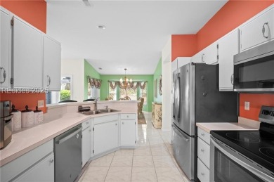 Light-Filled One-Level End Unit in Sun City! Nestled in a on Okatie Creek Golf Club in South Carolina - for sale on GolfHomes.com, golf home, golf lot