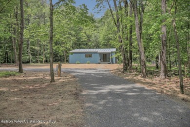 Experience modern simplicity in this newly built, thoughtfully on Rip Van Winkle Country Club in New York - for sale on GolfHomes.com, golf home, golf lot