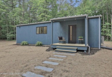 Experience modern simplicity in this newly built, thoughtfully on Rip Van Winkle Country Club in New York - for sale on GolfHomes.com, golf home, golf lot